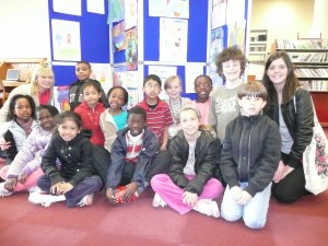 Third and Fourth visit the library with their artwork in the background